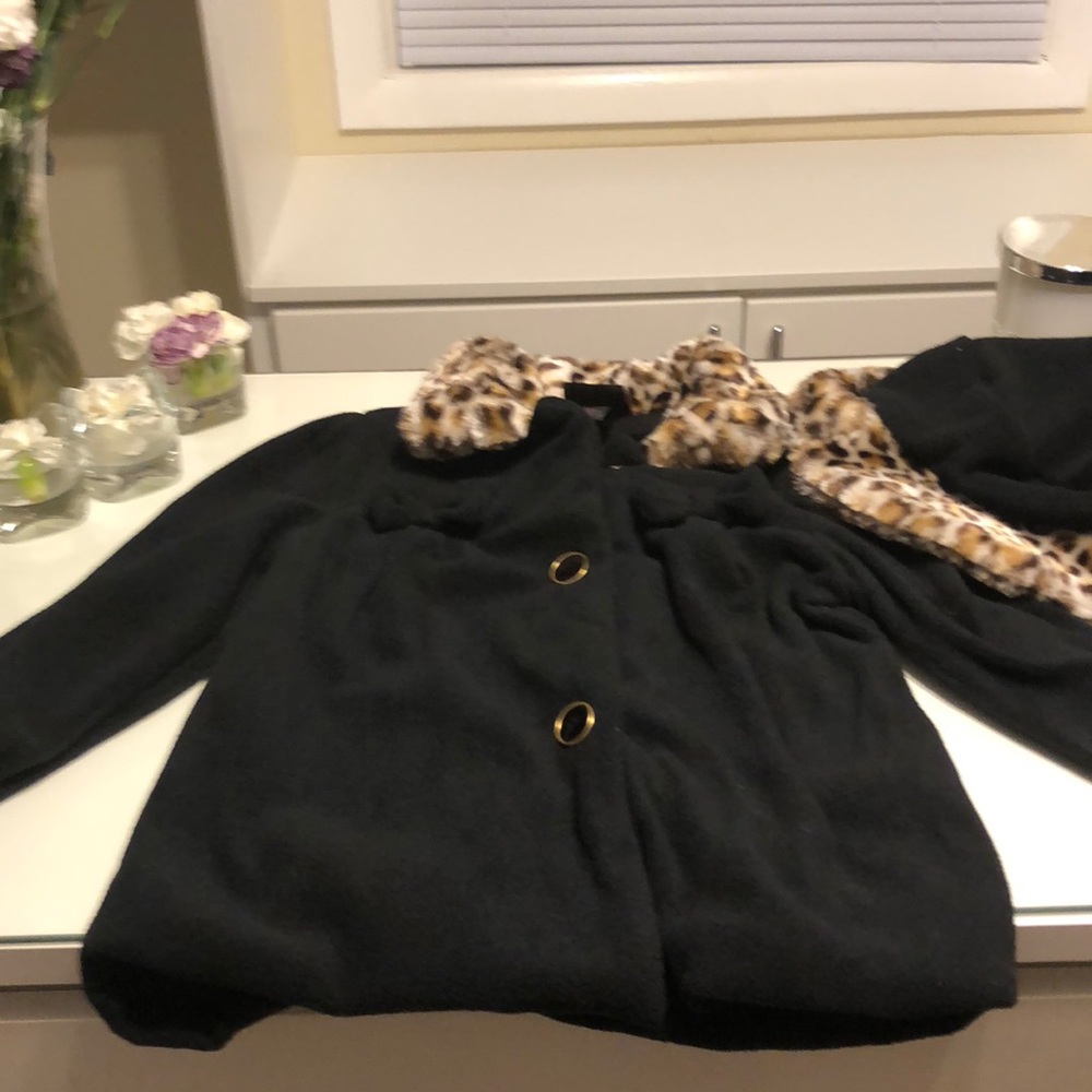 A little girls hat and coat set